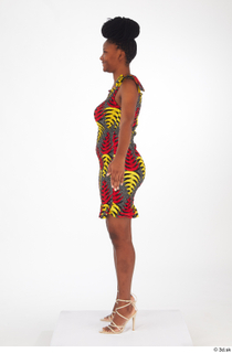 Dina Moses A poses dressed short decora apparel african dress…